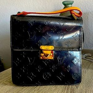 Louis Vuitton black and gold handbag